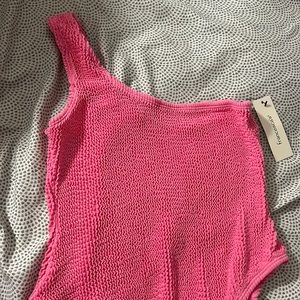pink body suit